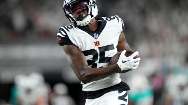 Sep 29, 2022; Cincinnati, Ohio, USA; Cincinnati Bengals wide receiver Tee Higgins (85) catches a pass and runs to the end zone in the second quarter against the Miami Dolphins at Paycor Stadium in Cincinnati. Mandatory Credit: Kareem Elgazzar-USA TODAY Sports